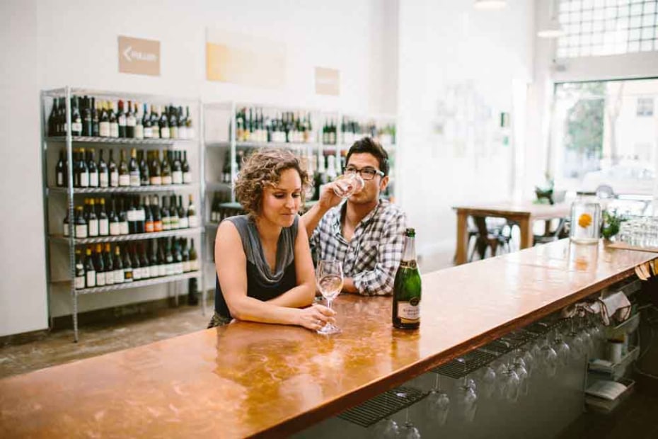 Stevie Stacionis and Josiah Baldivino in their bottle shop at Bay Grape in Oakland, picture