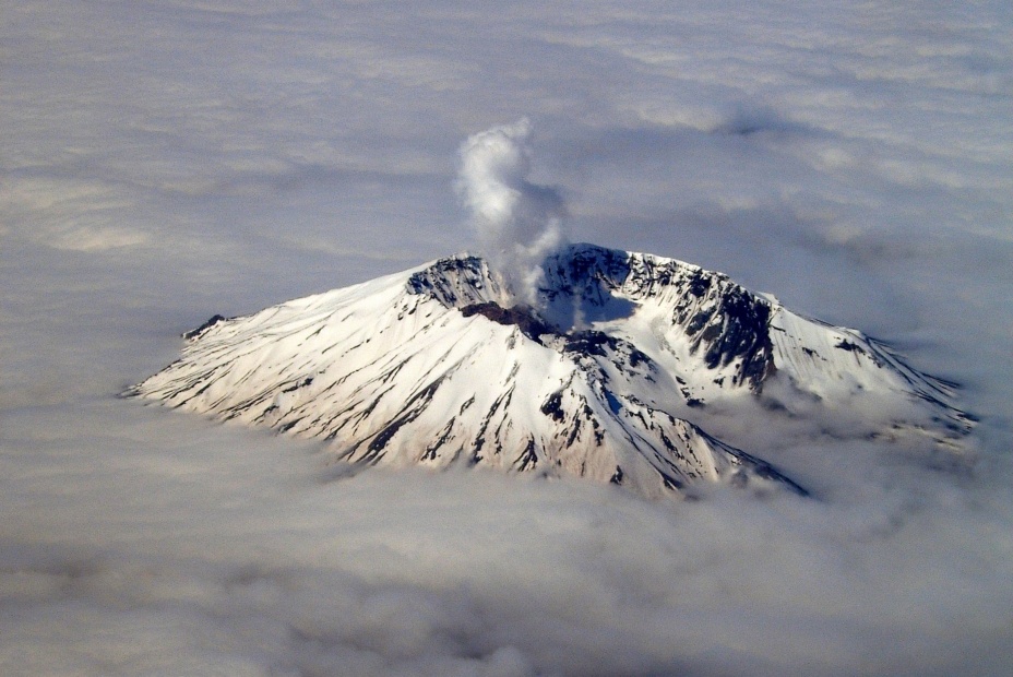 Steam rises above the reshaped Mount St. Helens volcano, image