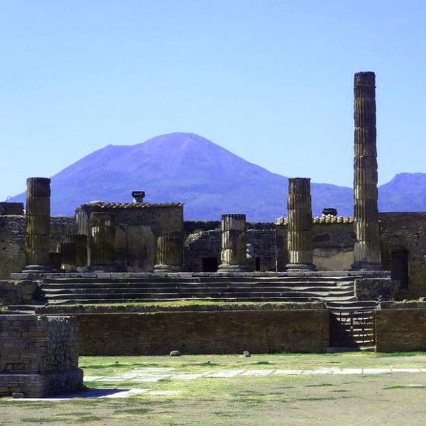 Mount Vesuvius behind Temple of Jupiter, Pompeii, Italy, image