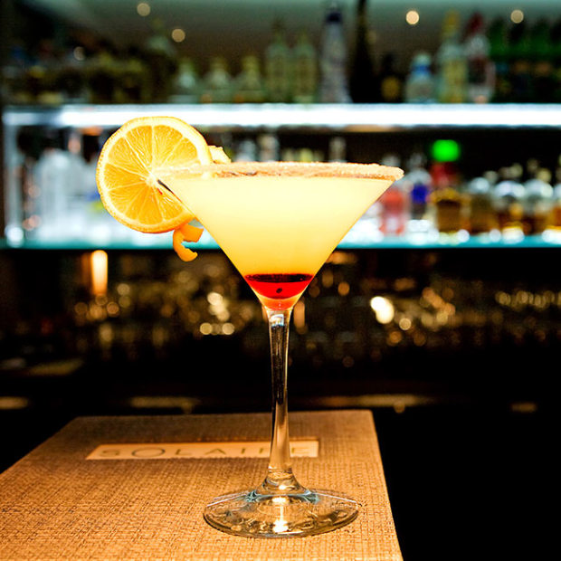 a lemon adorns Solaire's signature Lemon Ginger Drop cocktail