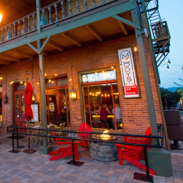 exterior with table seating and fire pit at Moody’s Bistro Bar & Beats in Truckee. California, picture 