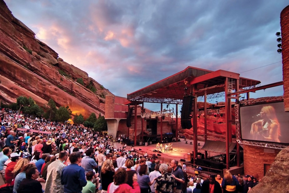 outdoor crowd takes in a concert at twilight at Red Rocks Park and Amphitheatre near Denver, Colorado, picture