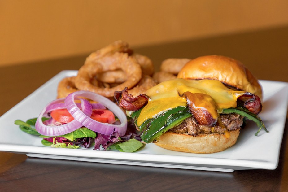 cheeseburger topped with green chiles and cherrywood-smoked bacon at the Cafe in Sonoita, Arizona, picture