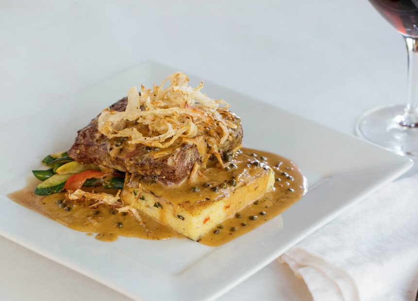 flatiron steak served with polenta cake, onion frites, and brandy/green peppercorn sauce at Up the Creek Wine Bar and Bistro, Cornville, Arizona, picture