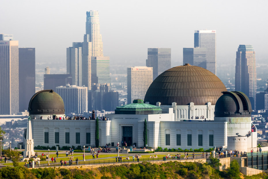 picture of Griffith Observatory during daytime hours with the Los Angeles skyline in the background