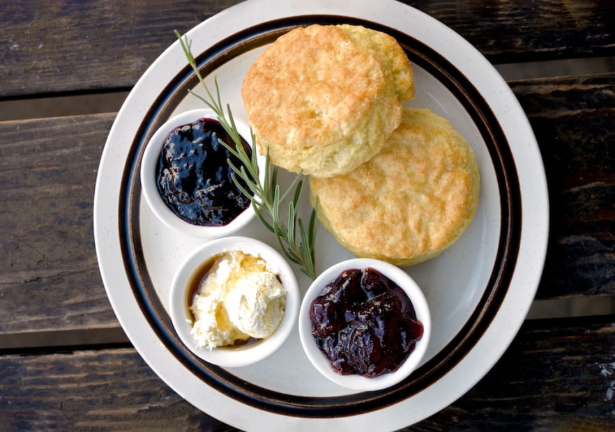 Biscuits and spreads on a plate from Pine State Biscuits