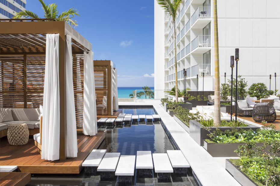 The cabanas at 'Alohilani’s rooftop pool deck, image
