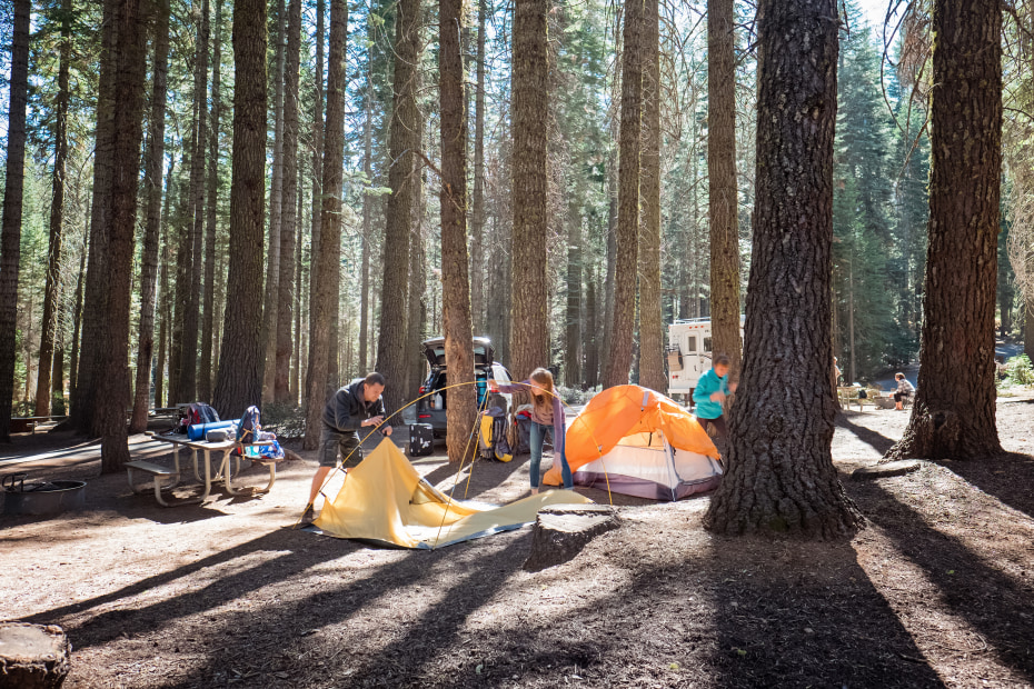 A family sets up camp in Yosemite National Park, image