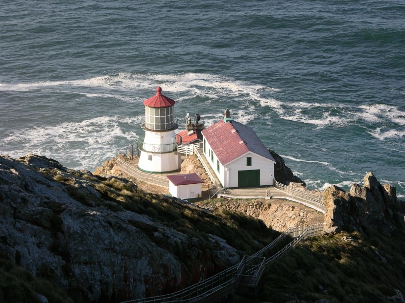 the Point Reyes Lighthouse with the ocean in the background
