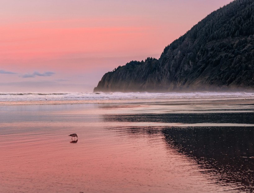 picture of the sun setting over the shower near Manzanita, Oregon