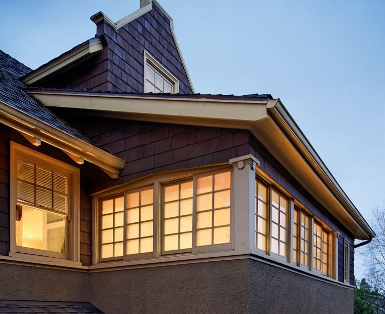 house windows backlit and screened from outside views, picture