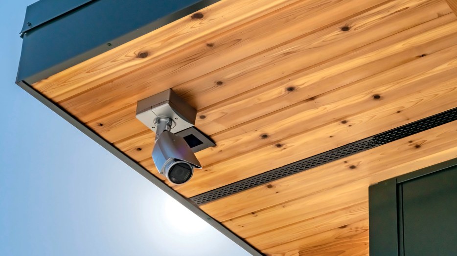 security camera mounted to exterior overhang, picture
