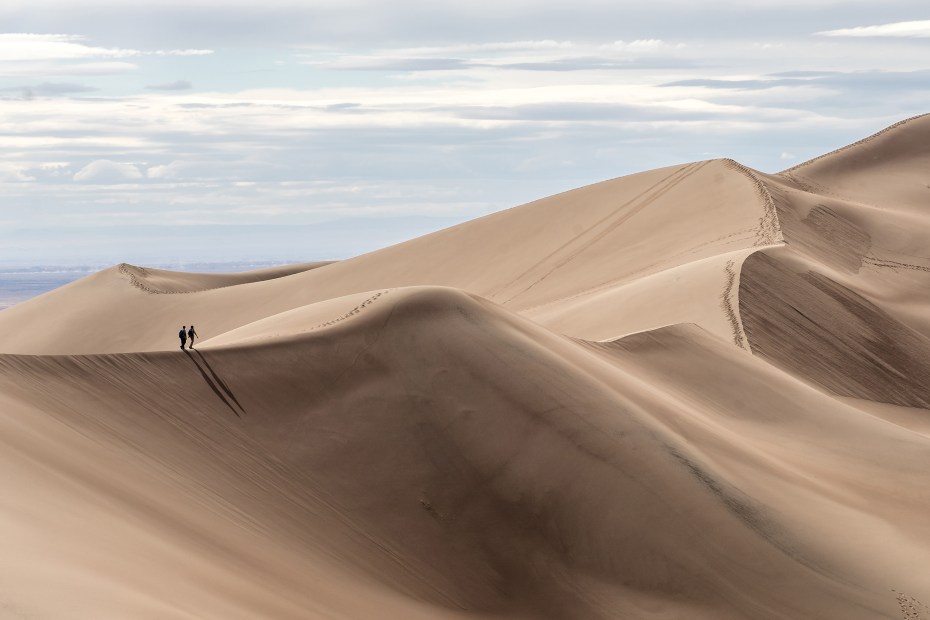 AAA Members hike in Great Sand Dunes National Park, Colorado.