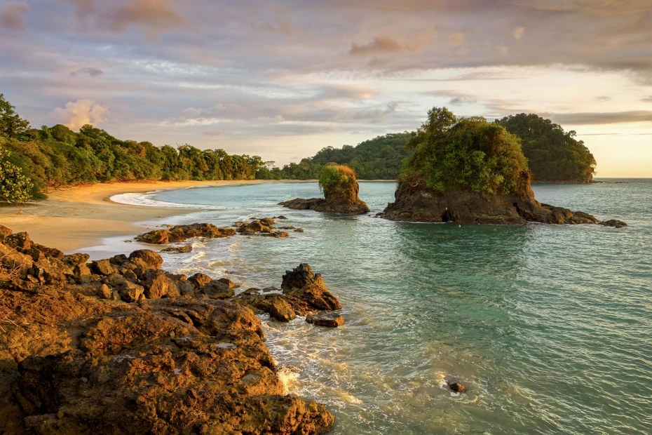 sunset over Playa Espadilla in Manuel Antonio National Park, Costa Rica