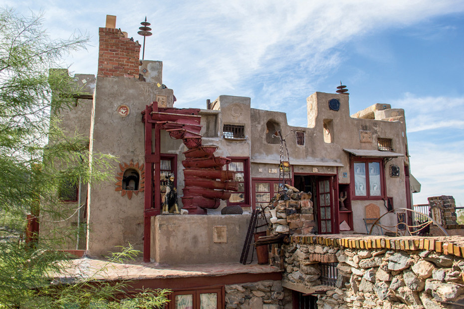 Mystery Castle exterior under partly cloudy, blue sky in Phoenix, Arizona