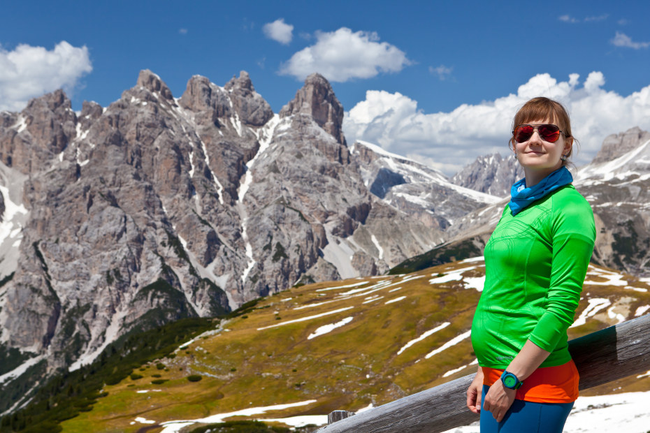 pregnant woman hiking in the Dolomites in Italy