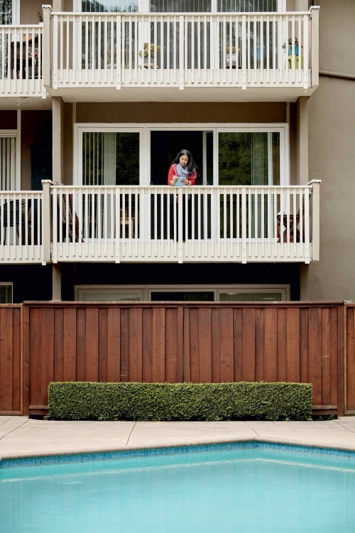 Trina Enriquez on her balcony