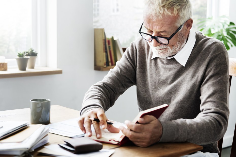 A man goes over his finances.