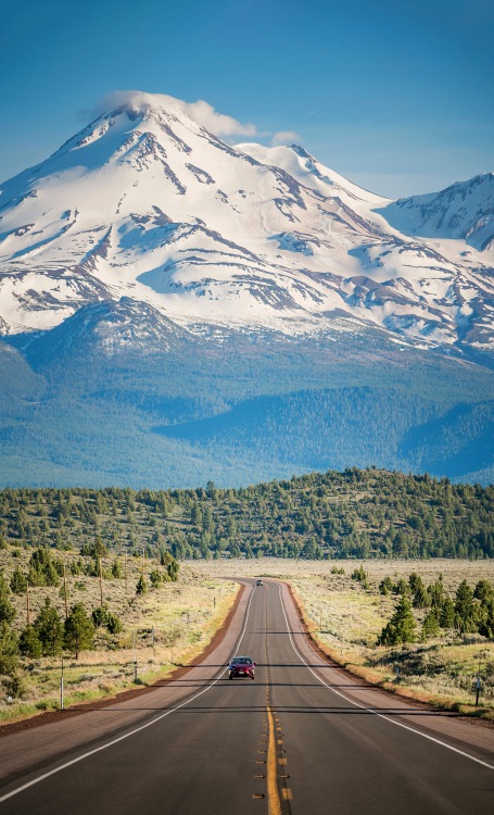 Highway 97 towards snowcapped Mount Shasta looming in background
