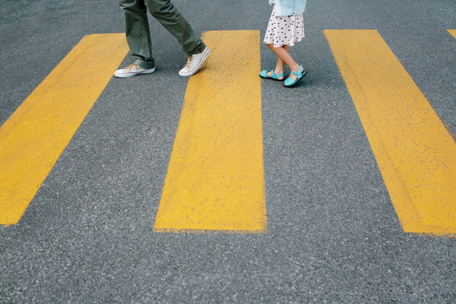 two pedestrians in crosswalk