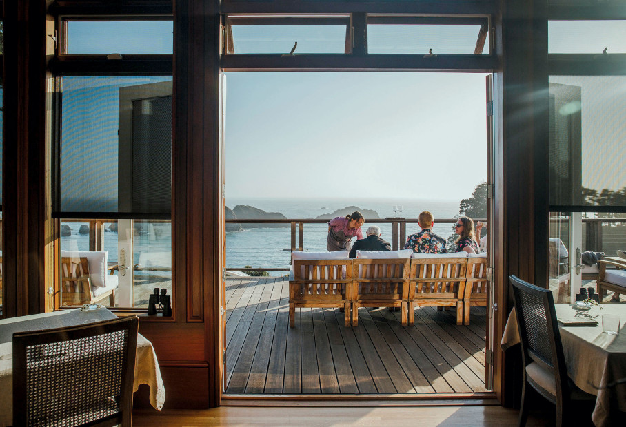 diners on the patio at Harbor House Inn are treated to a spectacular ocean view  in Jenner, California