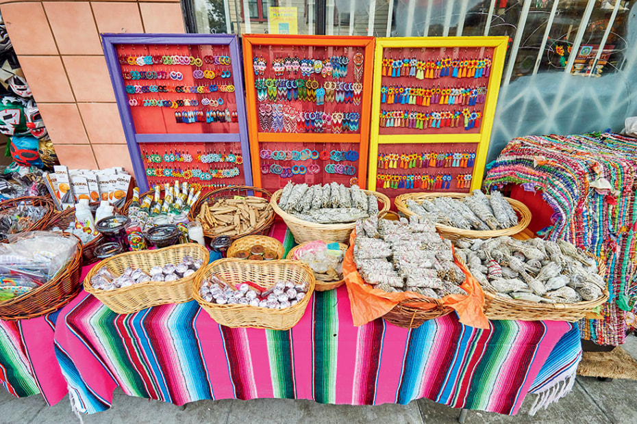 multi-colored display of Mexican goods in front of Mixcoatl in San Francisco's Mission District