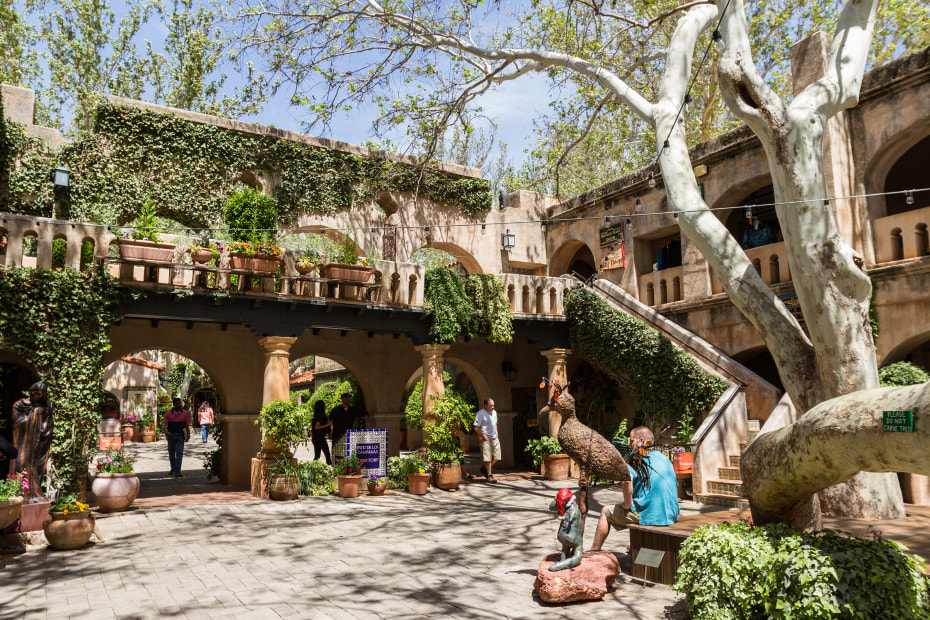 Visitors mill around the Tlaquepaque shopping center.