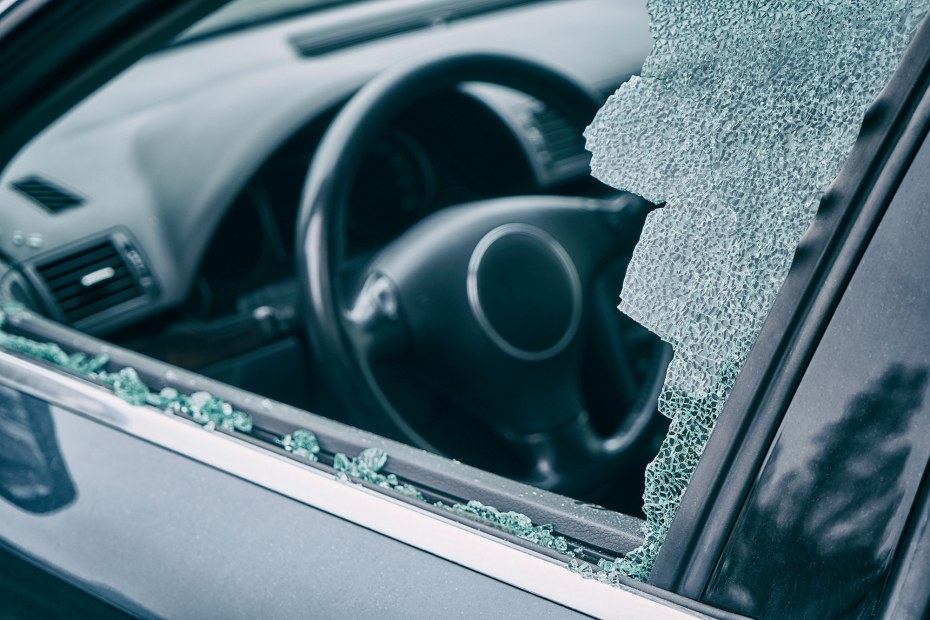 Broken driver's side car window.