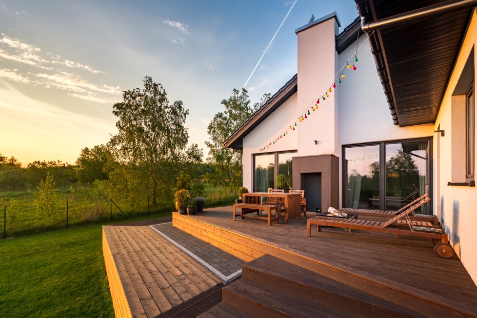 A clean deck bathed in golden light at sunset.