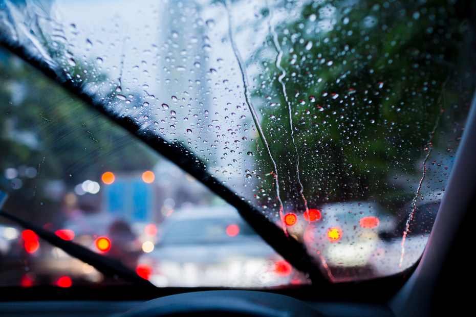 Windshield wipers clear rain.