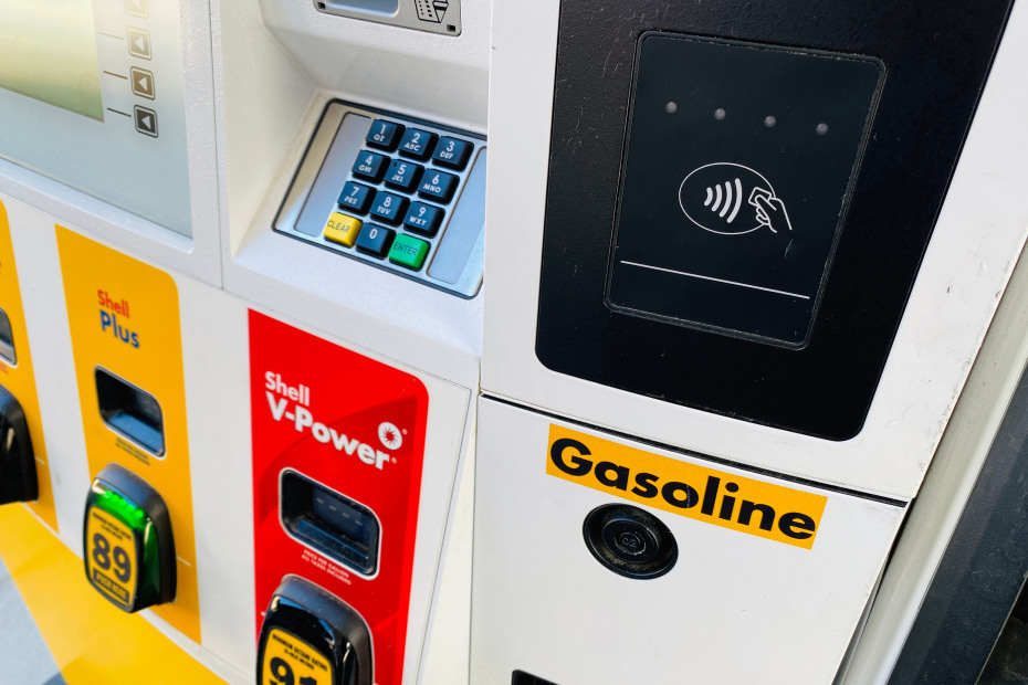 A contactless payment terminal on a gas pump.
