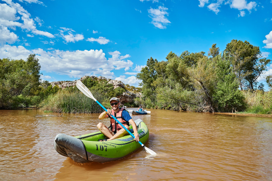 A couple kayak in the Verde River near Sedona, Arizona.