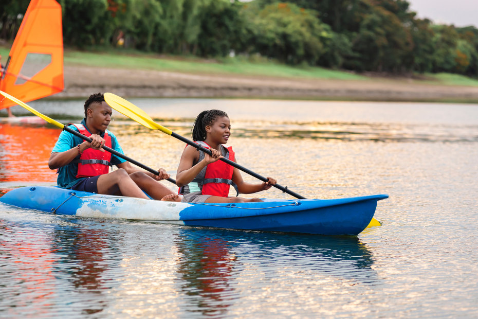 A couple canoe on a local waterway.