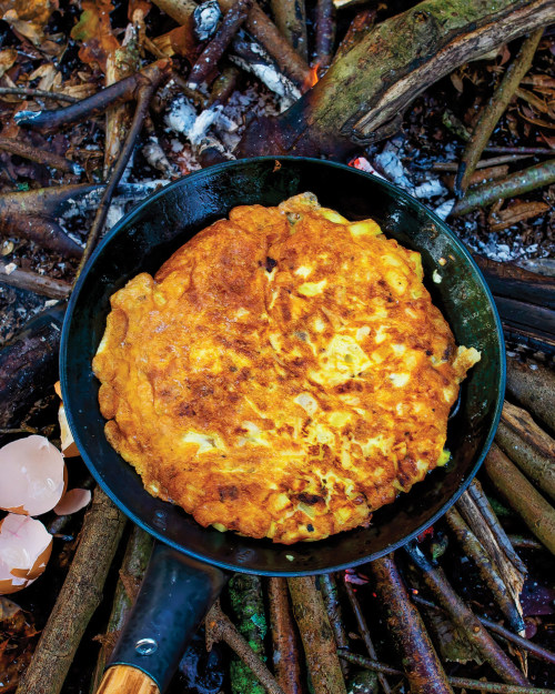 Spanish omelette cooked over a campfire.