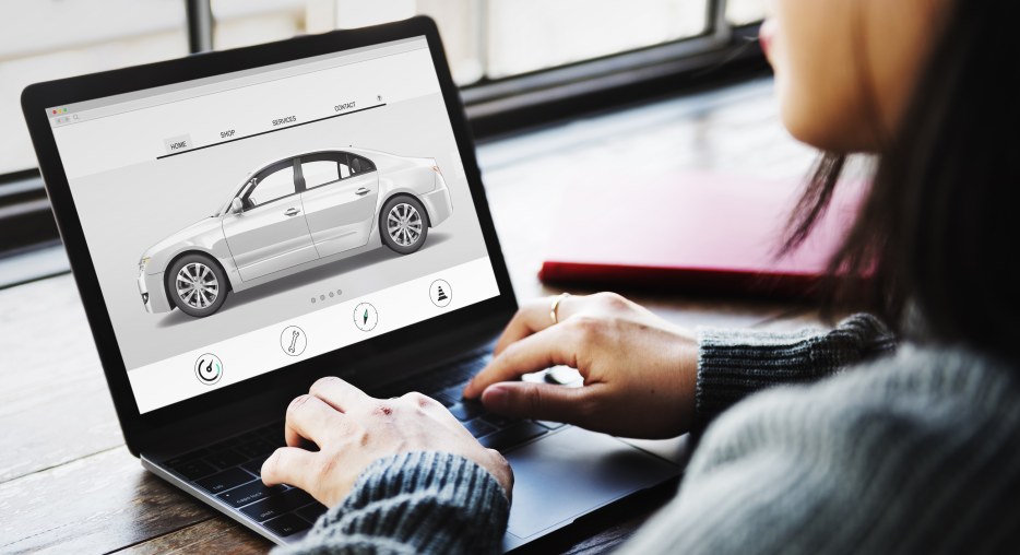A buyer researches a car online from home.