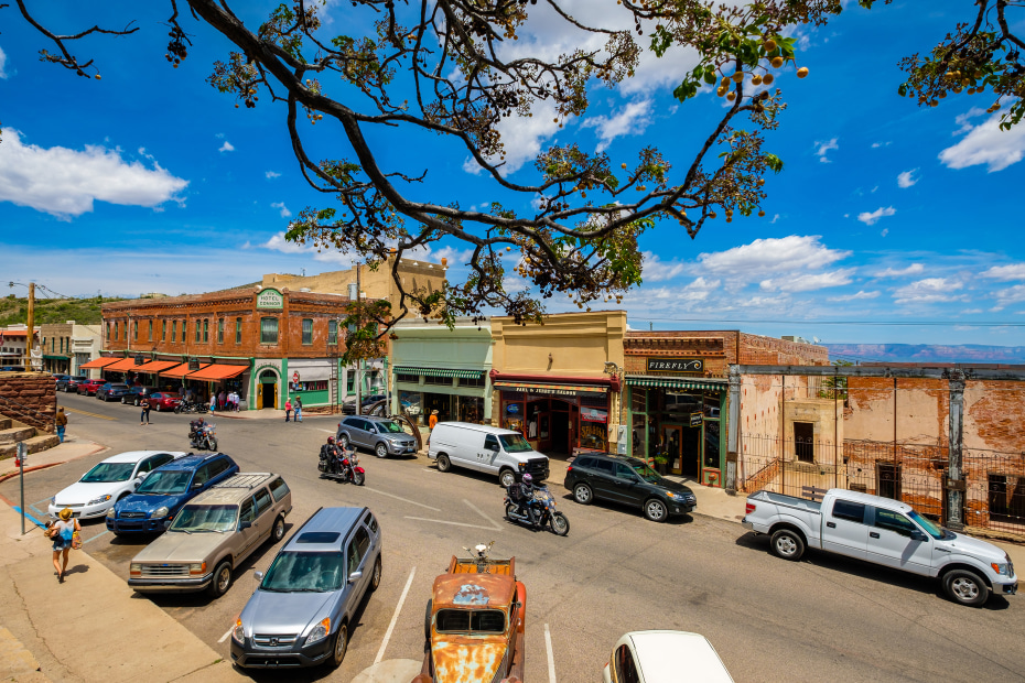 Cars parked on a historic street in downtown Jerome, Arizona.