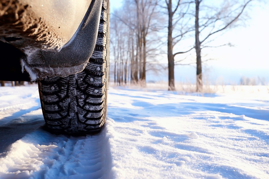 A tire on a snowy road.