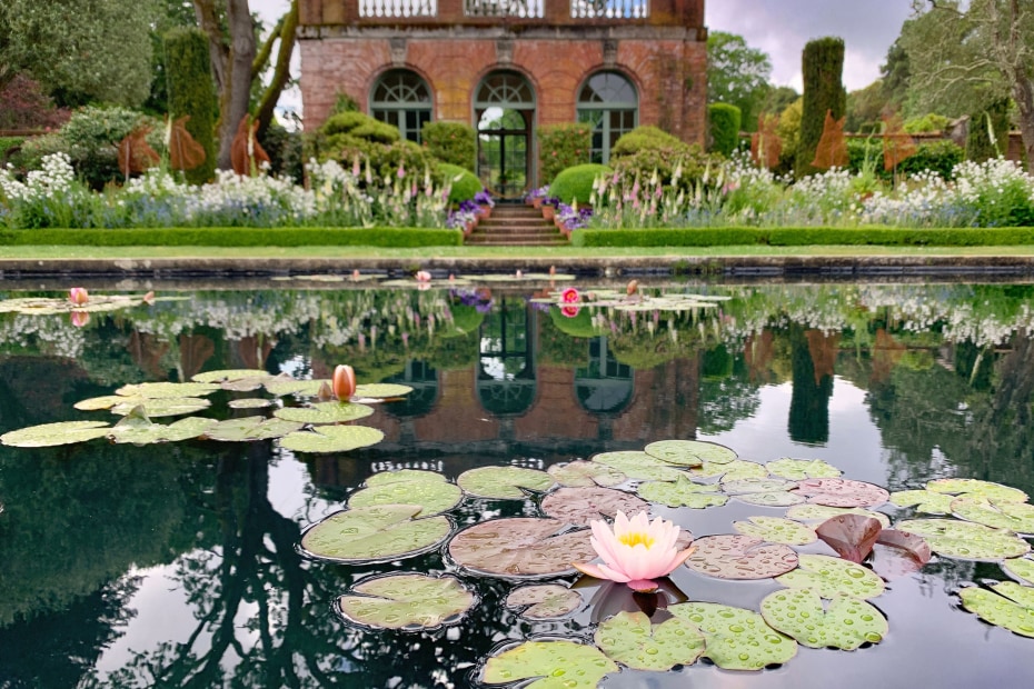 Filoli's sunken garden with waterlilies and the Garden House in the background.