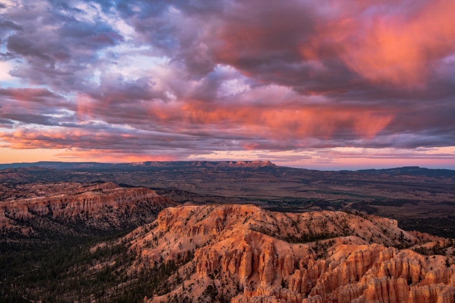 Spire shaped rock formations called hoodoos at sunset from Inspiration Point viewpoint in Bryce Canyon National Park in Utah
