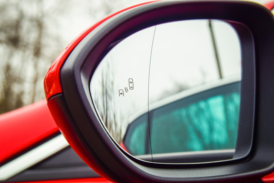 Blind spot light on a car side mirror.