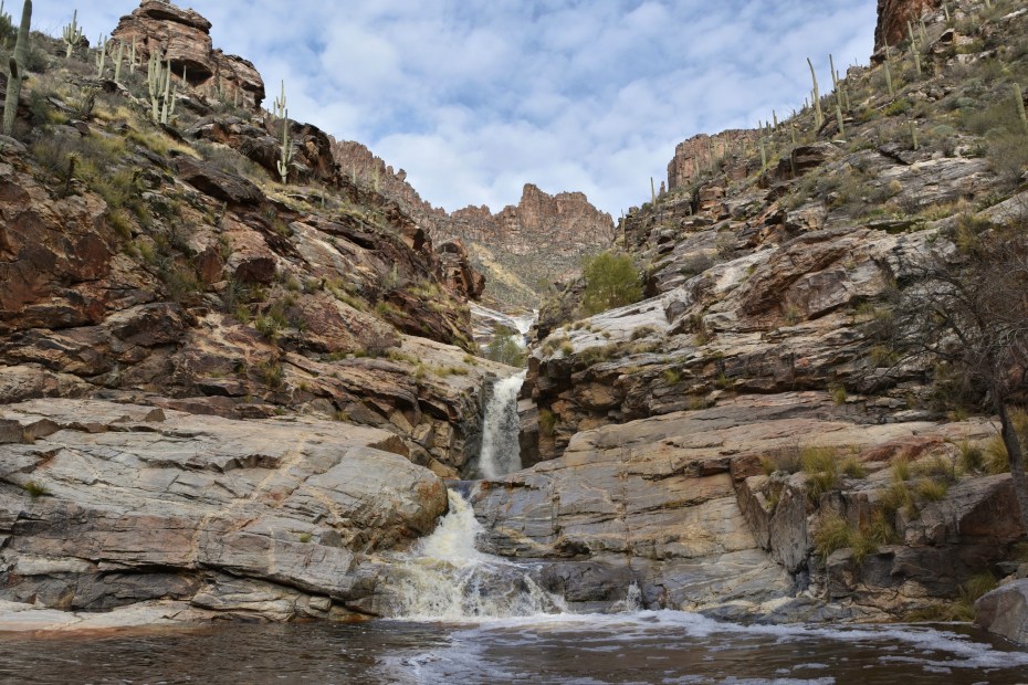 Seven Falls cascades down rocky canyon walls at the end of Bear Canyon Trail in Tucson, Arizona.