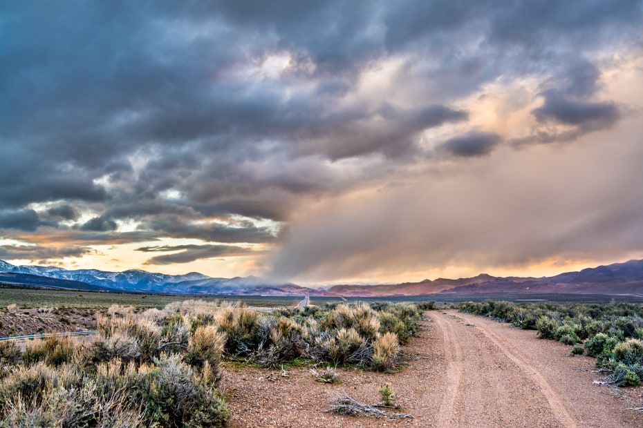 A dirt road cuts through Fishlake National Forest near Highway 89 in Utah.