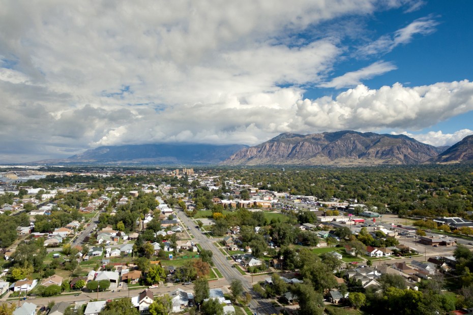 Aerial drone view above Ogden, Utah looking towards downtown and the commercial district