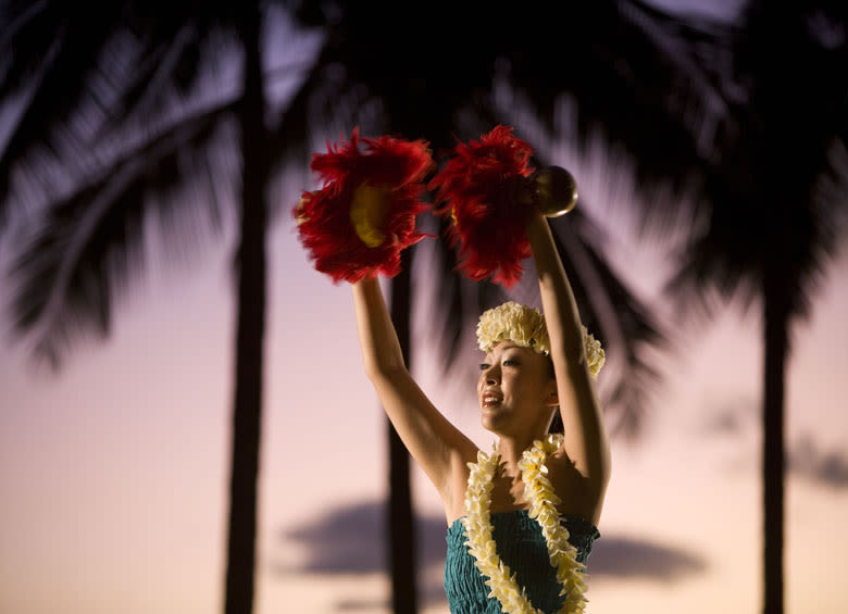 hula dancer performs at sunset on Kuhio Beach in Honolulu, Hawaii, picture