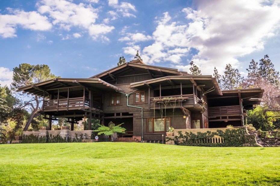 the exterior of Gamble House on a mostly sunny day, picture