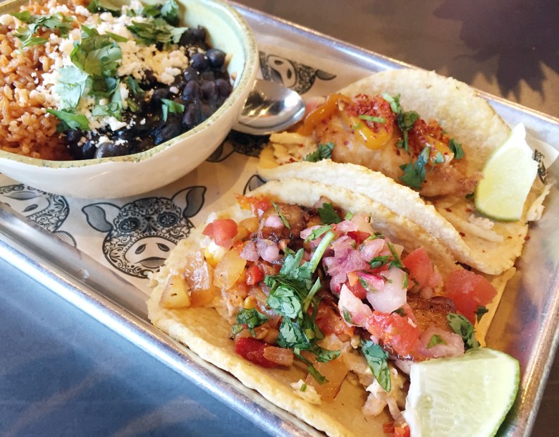 picture of a tray of tacos with beans and rice at Conchinito Taquery in Spokane, Washington