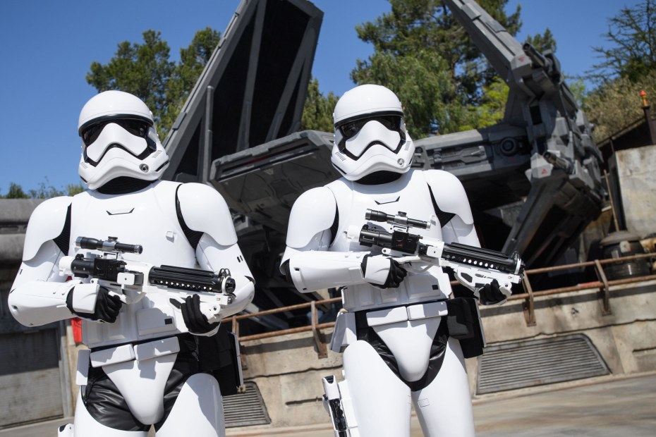 formidable-looking stormtroopers guard Kylo Ren and interact with visitors to Star Wars: Galaxy's Edge