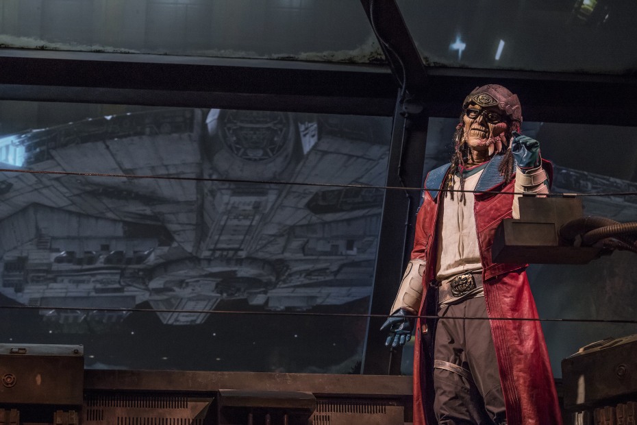 a very real-looking animatronic version of Hondo Ohnaka pilots the Millennium Falcon ride