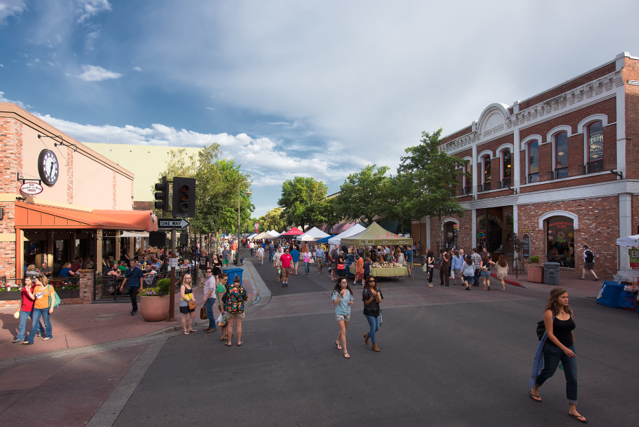 People walk the street at the Chico Thursday Night Market in downtown Chico, CA, picture