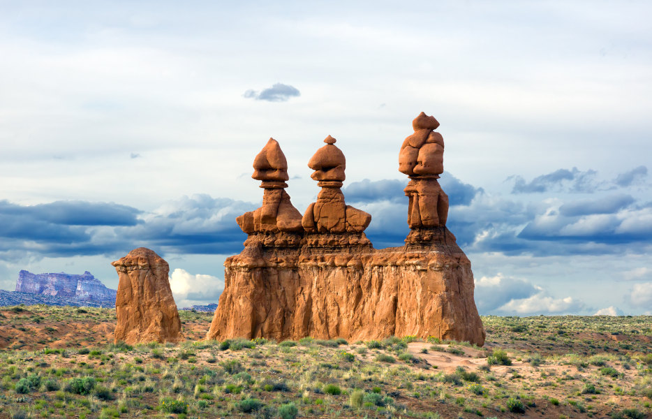 Isolated line of hoodoos, near the entrance to the valley in Goblin Valley State Park, Utah.